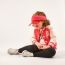 Little Girl Fashion Model With Red Cap