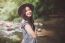 Beautiful Asian Woman Smiling Around The Nature Green And Water