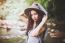 Beautiful Asian Woman Smiling Around The Nature Green And Water