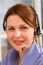 Young Businesswoman With Headset