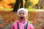 Lifestyle Portrait Of Little Happy Girl  In Autumn Park