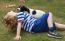 Boy Playing With Spaniel Puppy