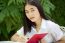 Thai Adult Student University Beautiful Girl Reading Red Book