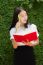 Thai Adult Student University Beautiful Girl Reading Red Book