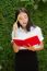 Thai Adult Student University Beautiful Girl Reading Red Book