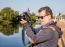 Elderly Man Photographs The Landscape