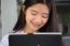 Portrait Of Thai Student Teen Beautiful Girl Using Her Tablet