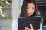 Portrait Of Thai Student Teen Beautiful Girl Using Her Tablet