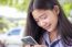 Portrait Of Thai Student Teen Beautiful Girl Using Her Phone And Smile