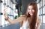 Portrait Of Thai Adult Beautiful Girl Using Her Smart Phone Selfie