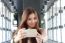 Portrait Of Thai Adult Beautiful Girl Using Her Smart Phone Selfie