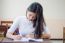 Portrait Of Thai Teen Beautiful Girl Writing Book