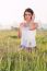 Model Sitting In Field