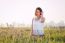 Model Sitting In Field