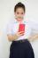 Portrait Of Thai High School Student Uniform Beautiful Girl Using Her Smart Phone Selfie