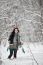 Beautiful Young Woman In A Sweater On A Winter Walk In A Wood