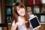 Portrait Of Thai Adult Student University Uniform Beautiful Girl Using Her Tablet