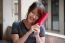 Portrait Of Thai Adult Beautiful Girl Reading Red Book