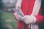 Woman In Wool Gloves Hold Smart-phone