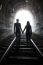 Couple Walking Together Through A Railway Tunnel