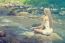 Beautiful Woman Practive Yoga On River In Nature