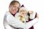 Caucasian Woman Embracing Model Of Santa Claus