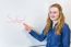 Dutch Teenage Girl Pointing At Word School Written On White Boar