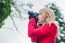 Young Dutch Woman Photographing Snow On Branches