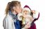 Woman Kissing Model Of Santa Claus