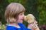 Young Girl Hugging Stuffed Dog