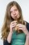 Blonde Teenage Girl Playing The Flute