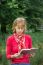 Woman Reading Book In Nature