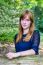 Portrait Of Dutch Redhead Teenage Girl In Forest