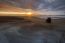 Photographer Taking A Sun Set Photograph On Hokitika Beach South Island New Zealand