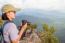 Hiker Teen Girl Holding A Camera For Photography