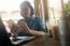 Young Asian Woman Working In Coffee Shop