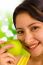 Young Lady Holding An Apple