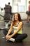 Happy Woman Having A Break From Exercising In Health Club