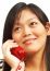 Woman Talking On A Landline Phone