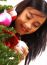 Girl Holding Christmas Bauble