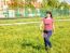 Young Beautiful Woman Playing Badminton