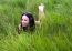 Young Woman Lying On The Grass