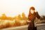 Woman Exercising Outdoor At Sunset 