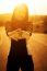 Woman Exercising Outdoor At Sunset 