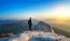 Man Stands On The Peak Of Stone In Bukhansan National Park,seoul In South Korea And Watching To Sunrise. Beautiful Moment The Miracle Of Nature