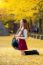 Beautiful Girl With Yellow Leaves In Nami Island, Korea. Nami Island In Autumn