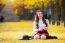 Beautiful Girl With Yellow Leaves In Nami Island, Korea. Nami Island In Autumn