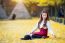 Beautiful Girl With Yellow Leaves In Nami Island, Korea. Nami Island In Autumn