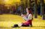 Beautiful Girl With Yellow Leaves In Nami Island, Korea. Nami Island In Autumn