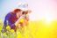 Woman Taking Photos At A Rapeseed Flowers